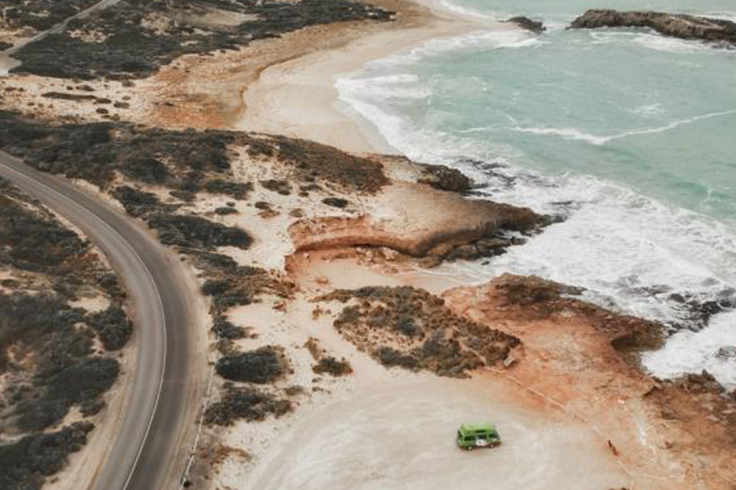 aerial view of jucy camper on south australia coastline