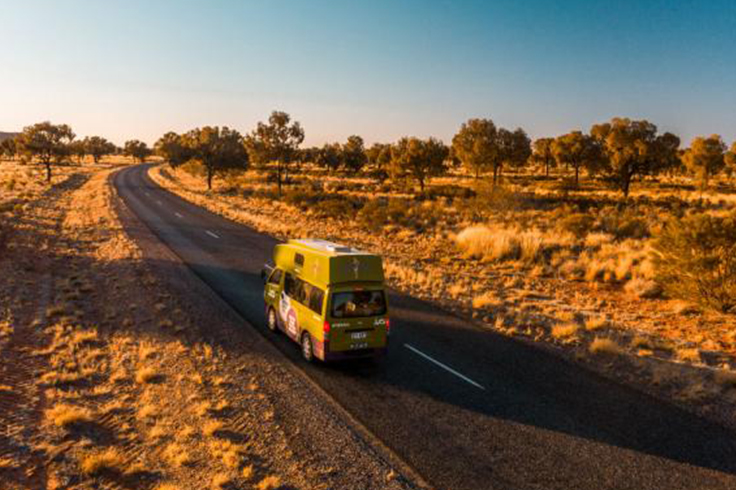 jucy van driving through the outback