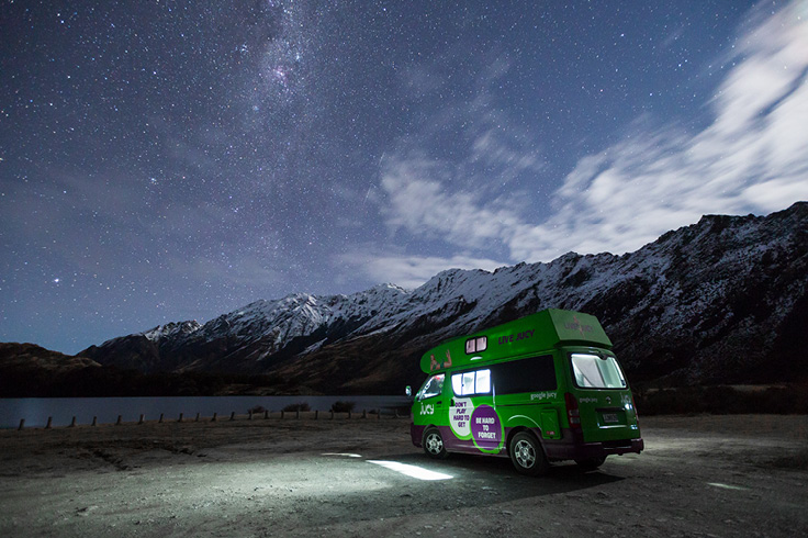 JUCY  campervan under starry sky