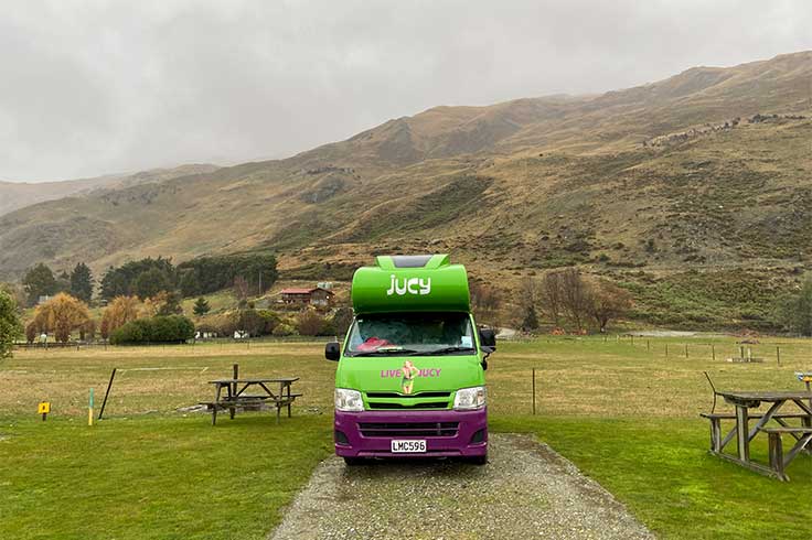 JUCY Campervan parked at Mount Aspiring Holiday Park