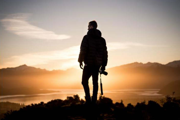 Photographer admiring sunset