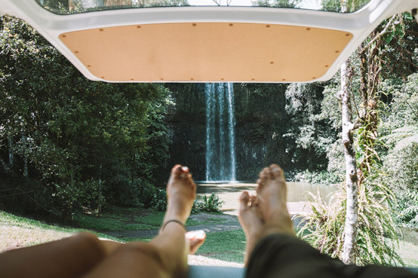 campervan-road-trip-waterfall-couple