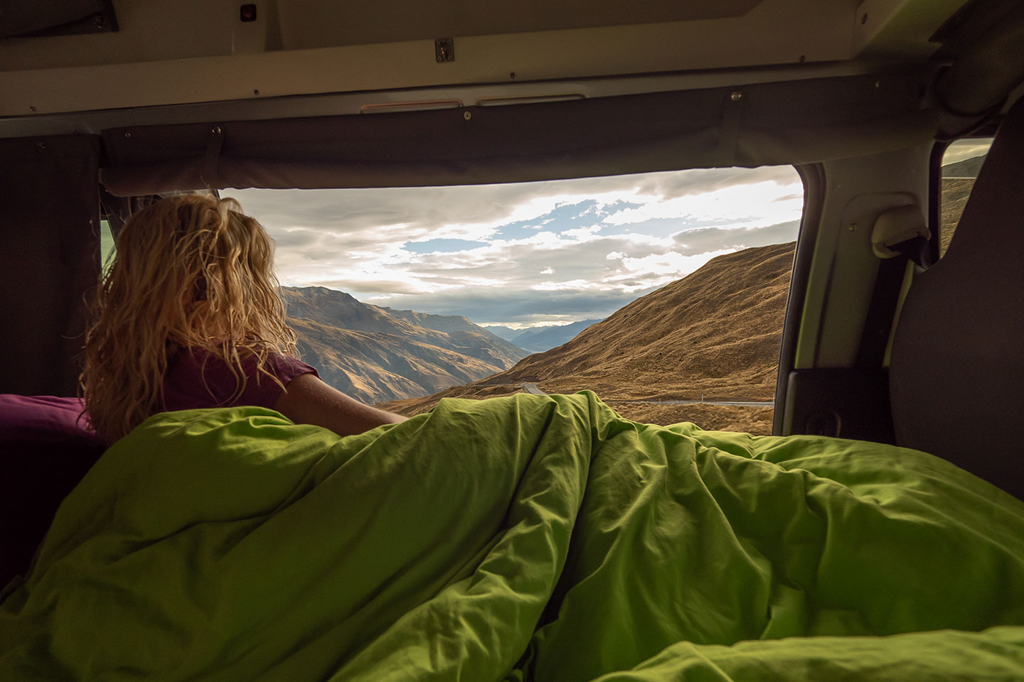 woman wakes up at stunning view in condo