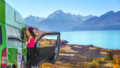 nz girl looking at lake pukaki